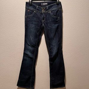 Women’s Hudson Bootcut Jeans Low rise, with button pockets on back.